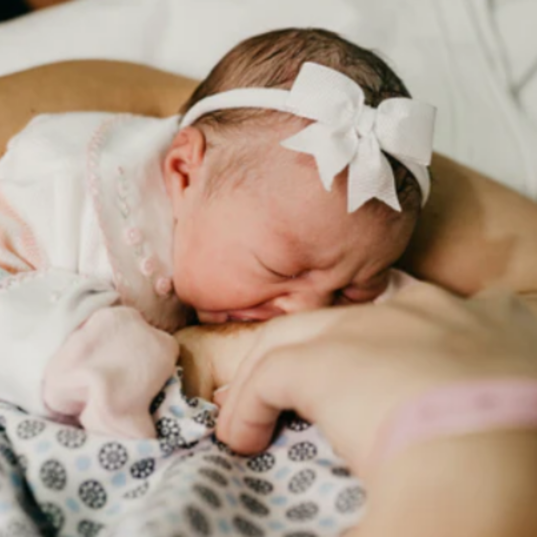 baby eating pumping bra