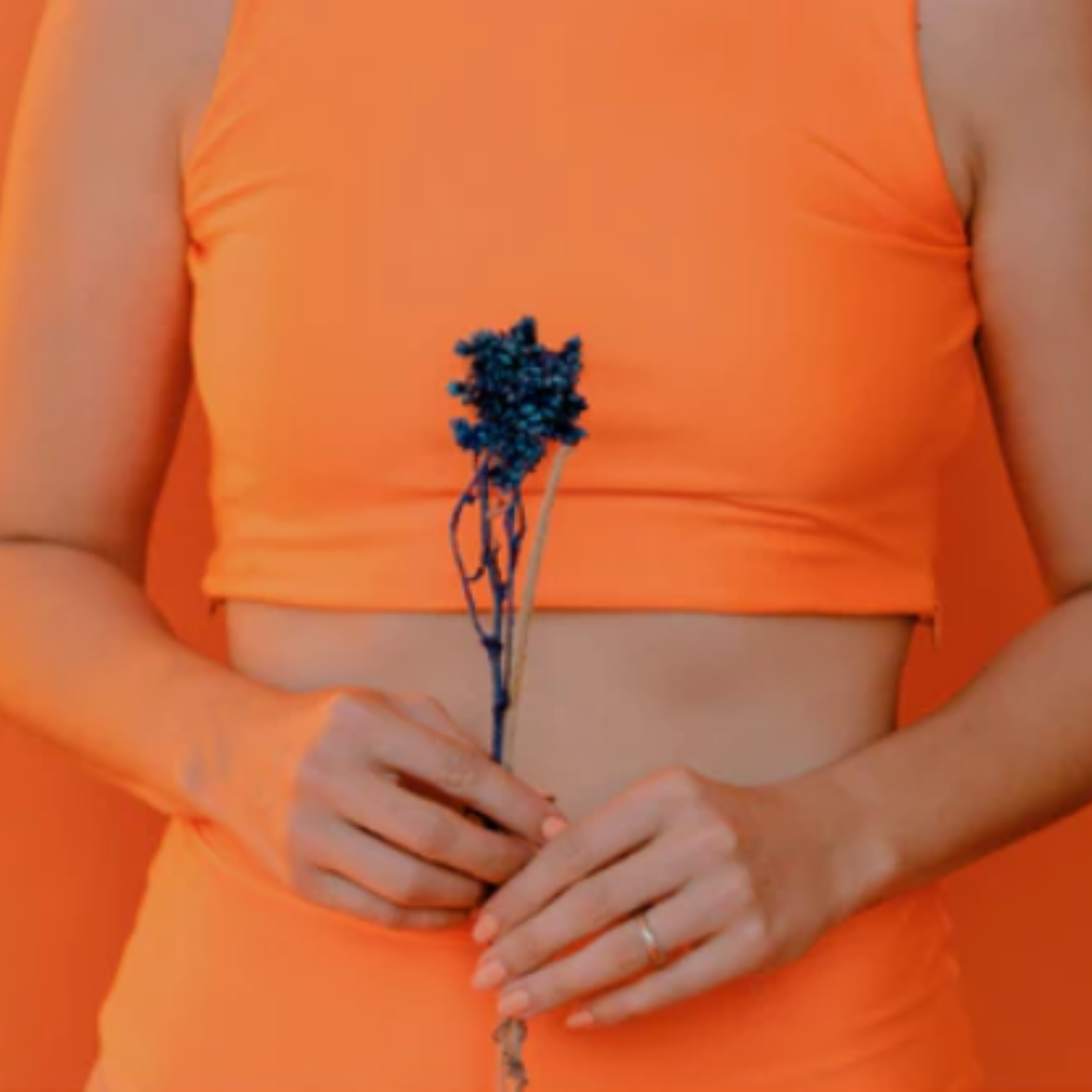 orange shirt, black rose