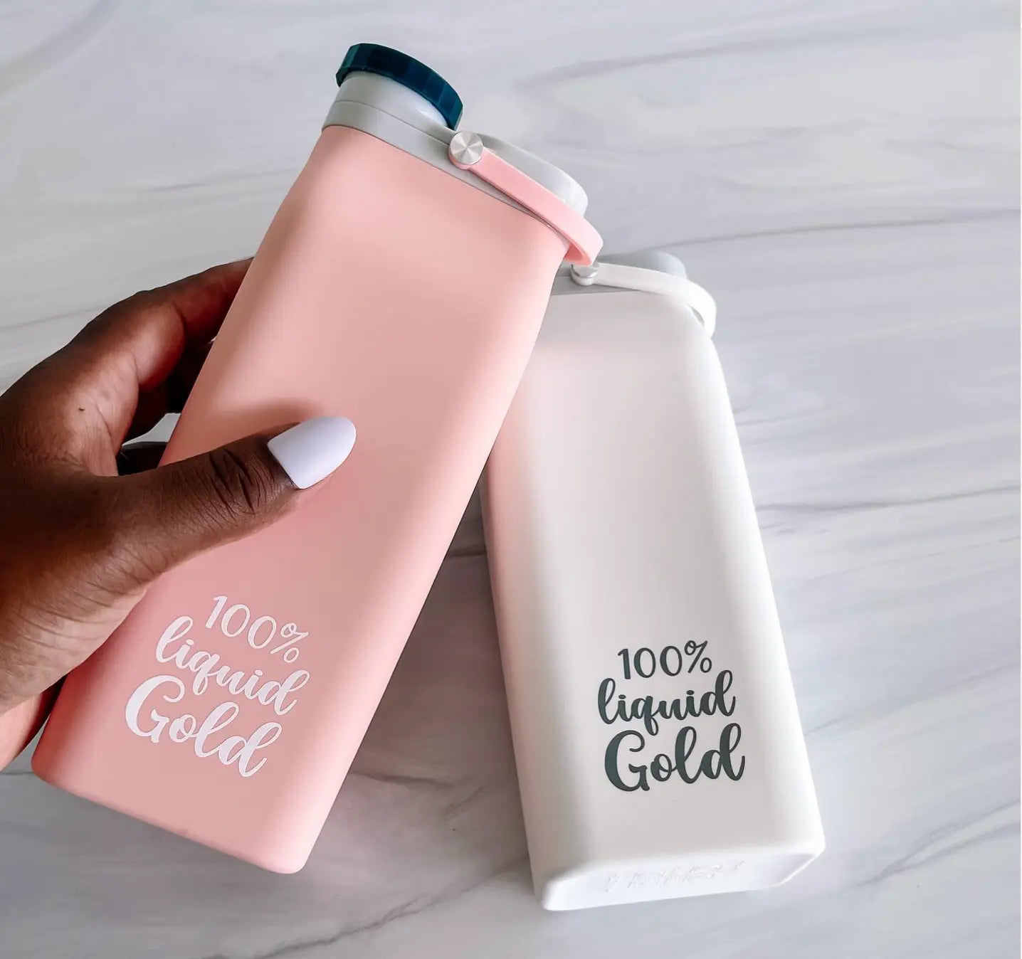 Junobie Milk Box pink - liquid gold - Junobie Milk Box the dairy fairy - pumping - the dairy fairy - image from the front - white and pink - pink and white