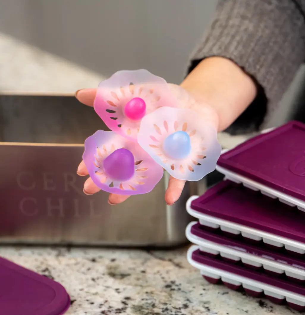 Colorful nipple shields in hand