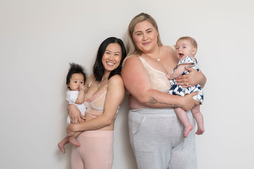 Two moms in pink bras with baby - jolie - jolie blush pumping bra - ruby - ruby pumping bra - ruby plus - mom with baby