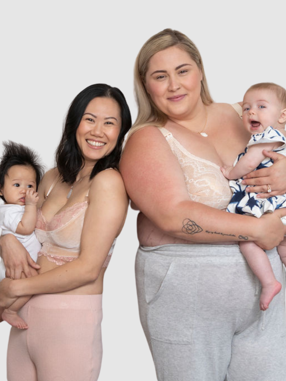 Two moms in bras with babires