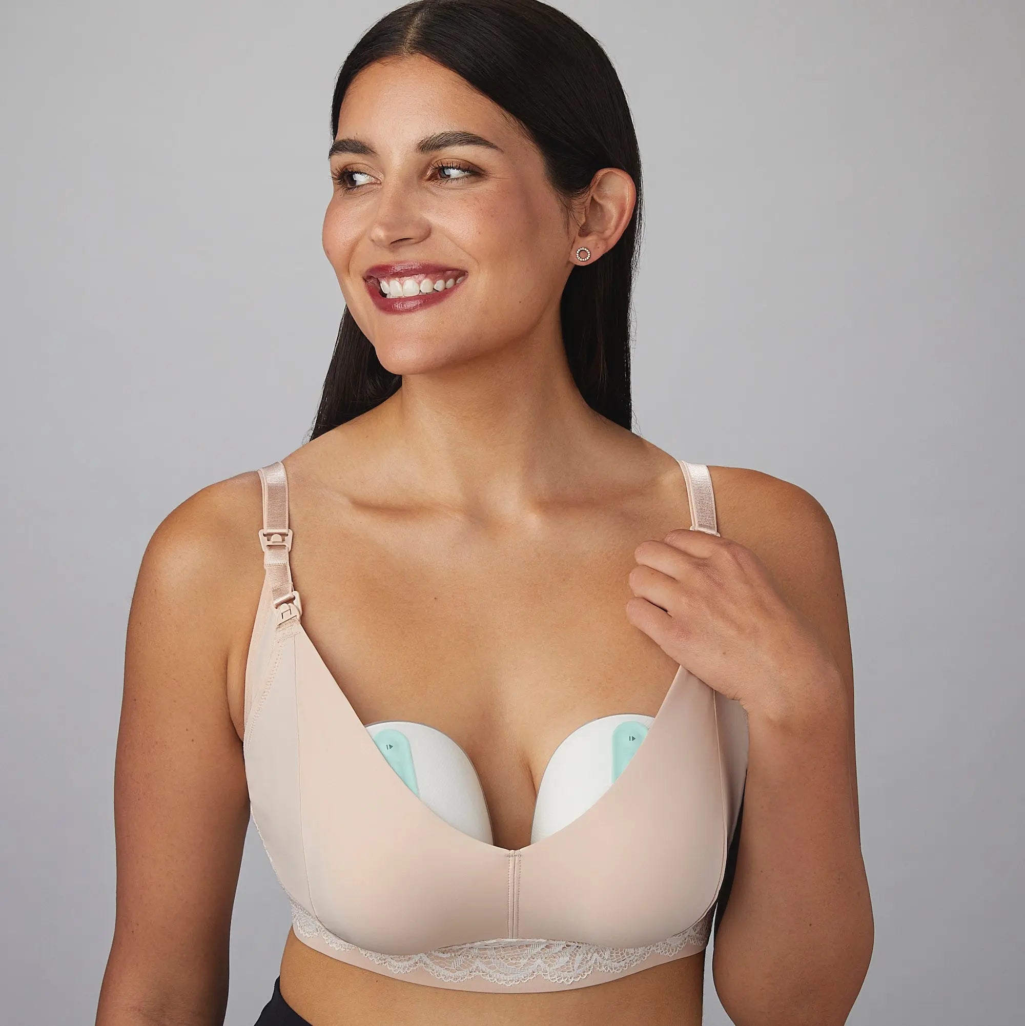 Luxe pumping bra champagne image from the front, woman lounging